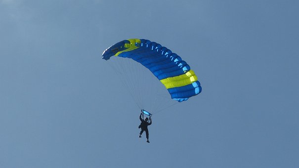 Skydivers fall with some gravitational potential energy